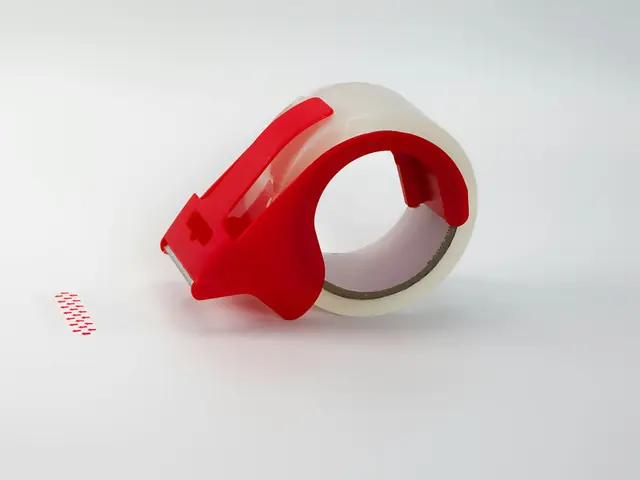 Clear packing tape in a dispenser